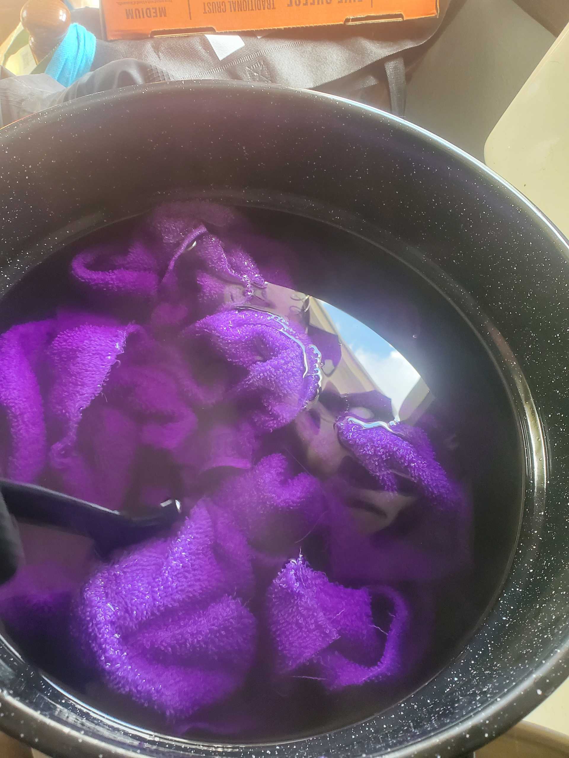  a large pot of fabric and dye